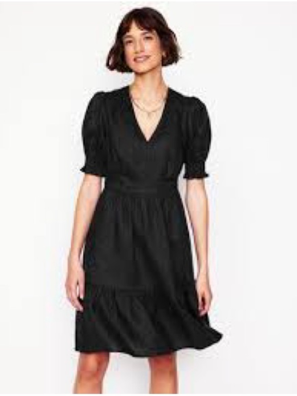 Boden Anna Linen short dress in black size 12P . Short puff sleeves, tiered.